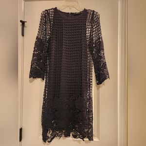 Black dress with crocheted overlay